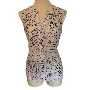 Sleeveless button down v cut front shirt